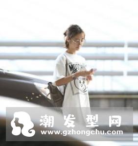 林心如花苞头发型图片 辣妈很年轻